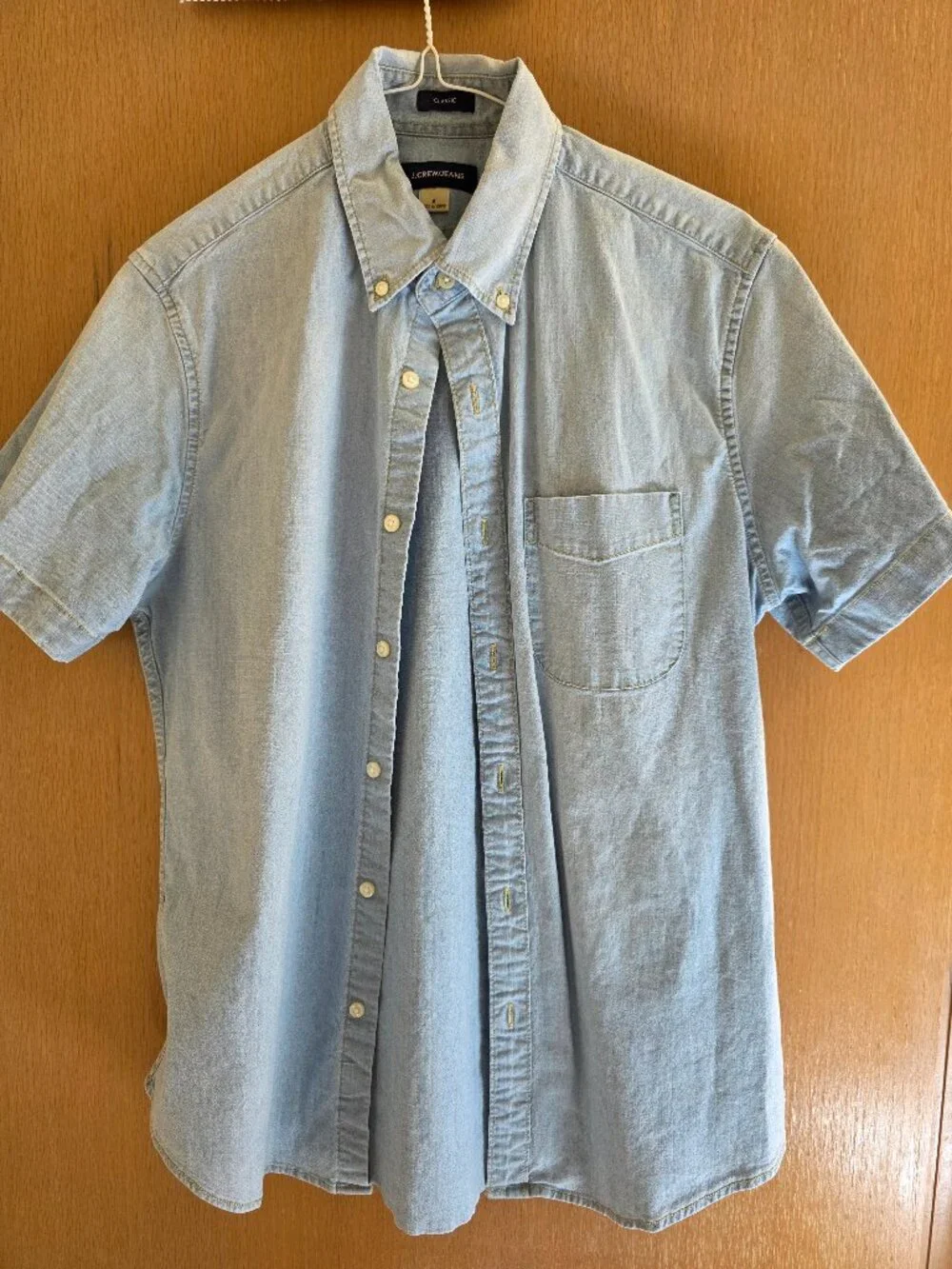 Small light blue denim short sleeve button down shirt